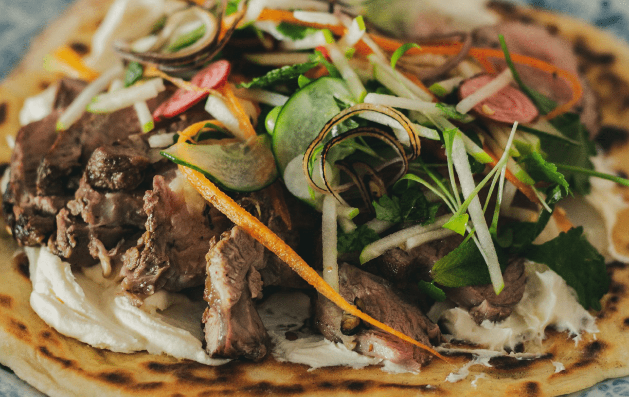 Marinated Spring Lamb Flatbreads with Labneh & Pickled Cucumber Salad